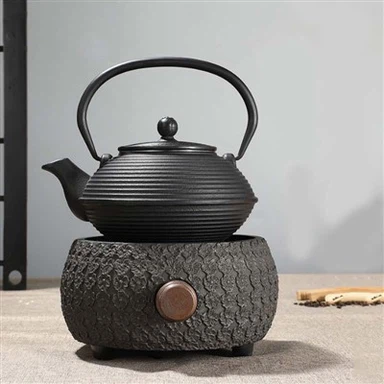 Teapot tal-ħadid fondut bil-kamin magħmul bl-idejn